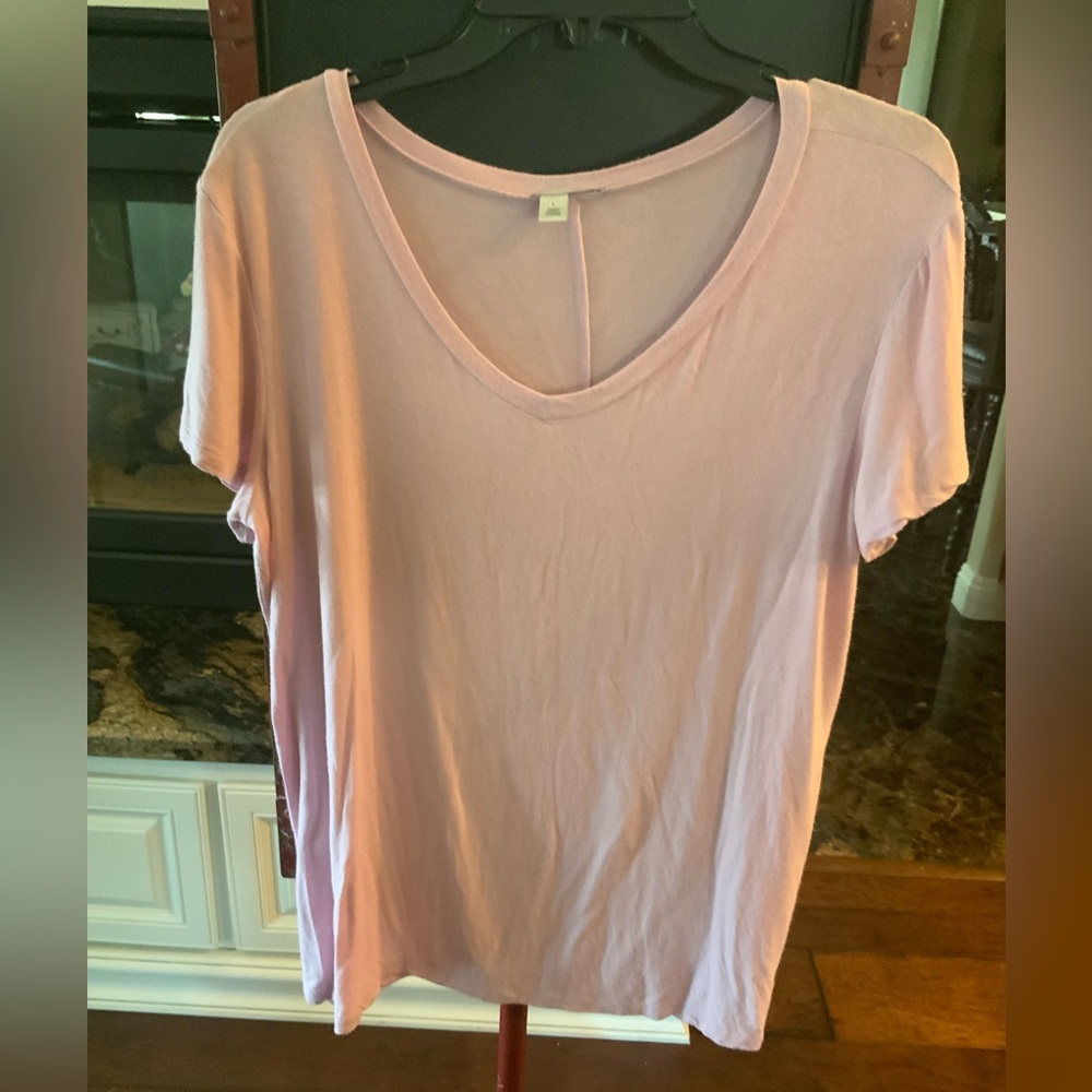 Light pink, v-neck tee.
